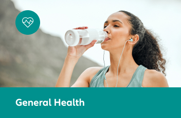 Woman drinking from bottle