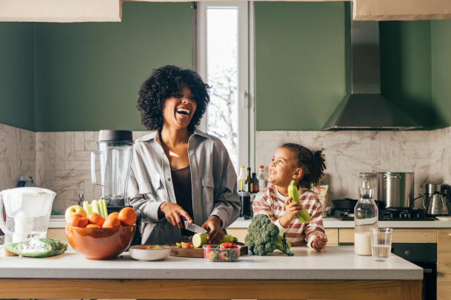 Mother and daughter cooking